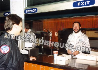 President of Disney Television Animation, Gary Kriesel, serving up hot dogs for the evening at a Disney employee Christmas party at Disneyland